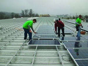 Stoltzfus Structures installed solar panel to harness the sun’s energy.